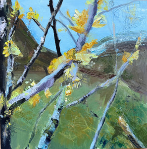 A lively abstract landscape of branches blossoming with yellow-orange buds on a green background with light blue sky. There is a feeling of aliveness, immediacy and freshness. 